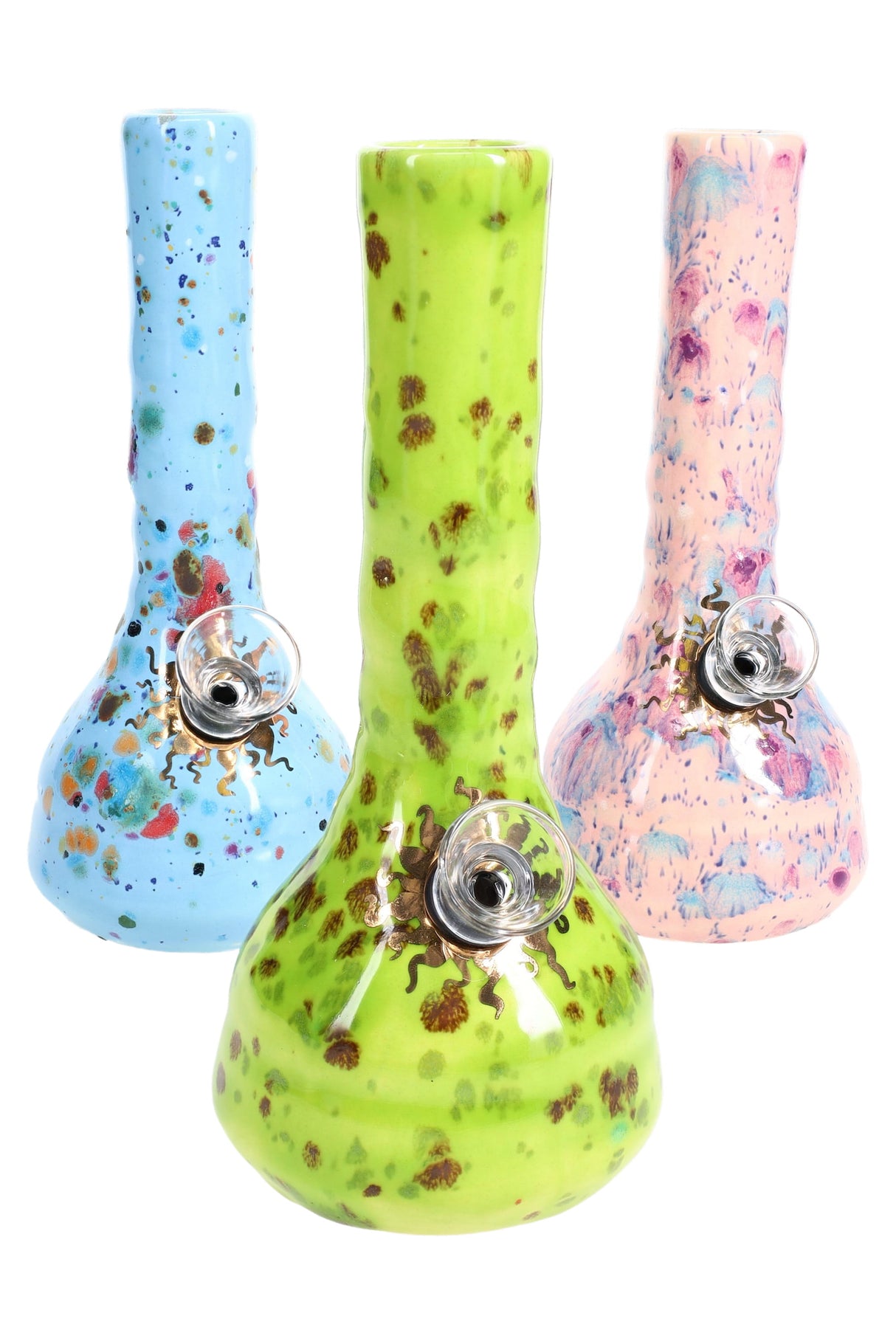 Trio of Crystal Burst ceramic bongs in blue, green and peach variants side-by-side to display color options.