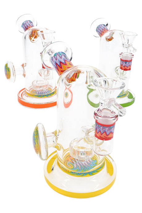 Three clear reverse-accent glass mini bongs with showerhead percs and color bases, 5″ size with side grip marbles.