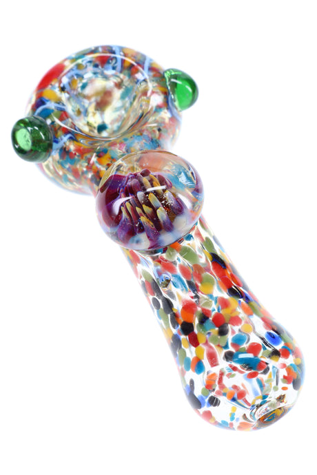 Closeup of confetti frit spoon pipe showing deep bowl, striped head, and raised floral marble detail on thick color-changing glass.