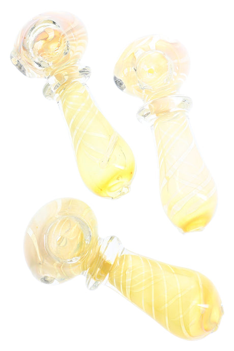 Three 3-inch silver-fumed spoon pipes with spiral ring accent and gold tint on white background showing color change