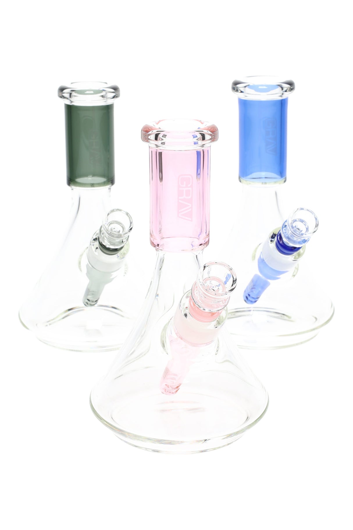 Clear GRAV Small Deco beaker bong trio with colored necks and matching 10 mm downstems in pink, blue, and smoke; compact beaker bases shown.