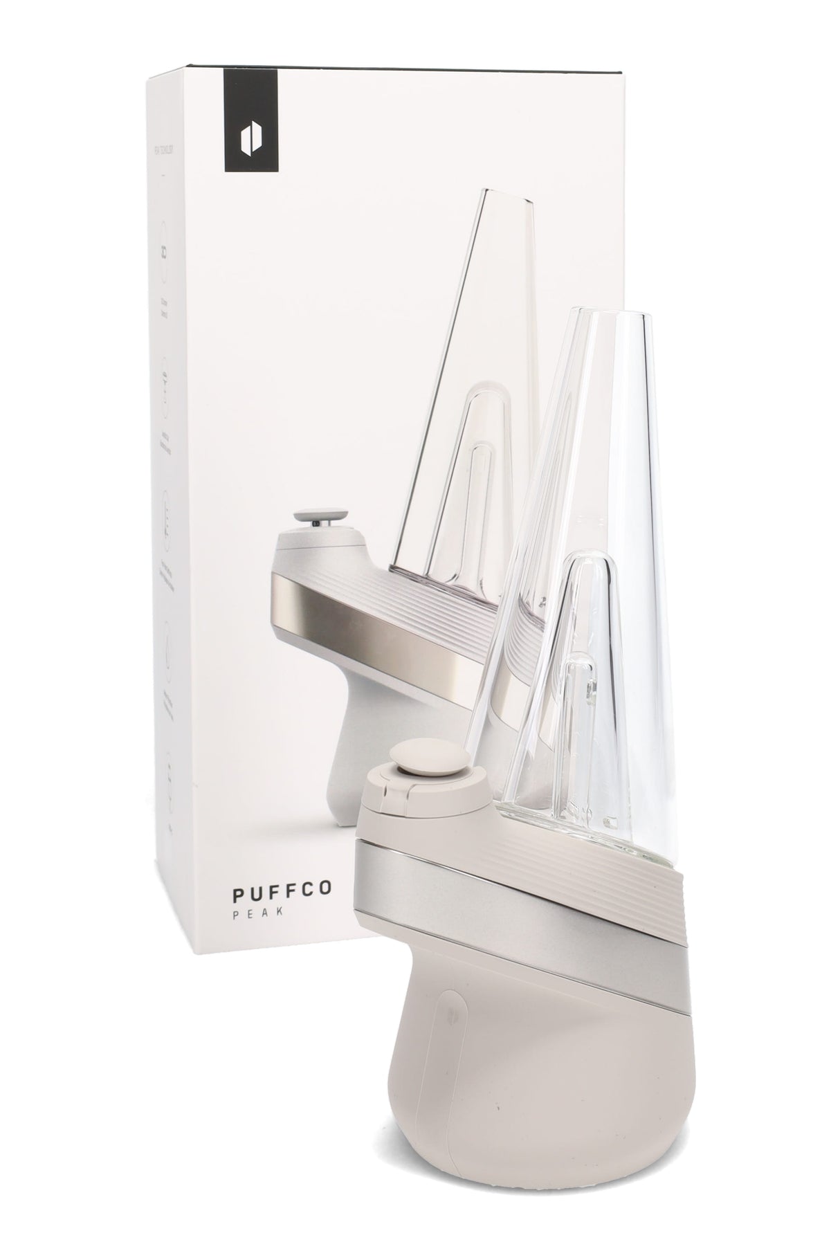 Puffco New Peak e-rig in light gray next to retail box, removable cone glass and tapered handheld base shown.