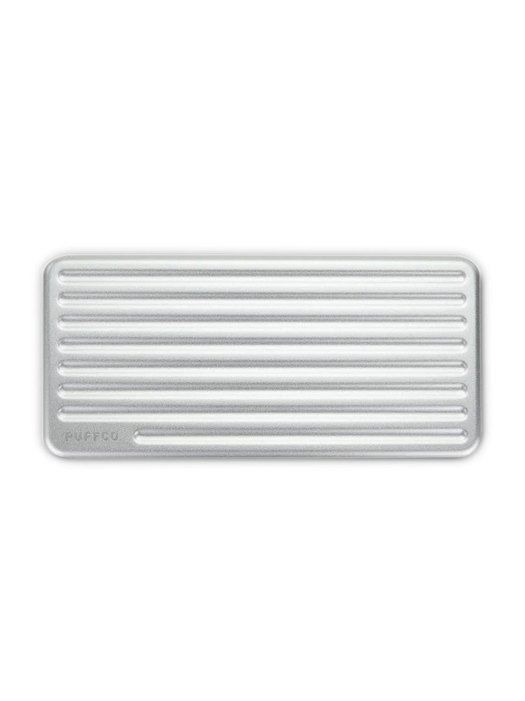 Top-down view of Puffco Pivot travel case showing grooved Pearl aluminum lid with rounded corners and PUFFCO logo.