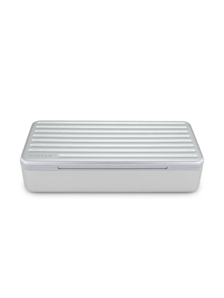 Pearl Puffco Pivot travel case angled view highlighting low-profile ribbed lid and compact rectangular design.