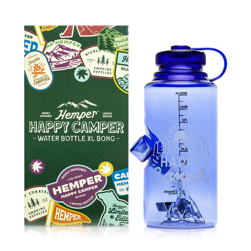 Front view of blue Happy Camper water bottle bong and matching box, showing volume markings, logo art and internal mountain perc.