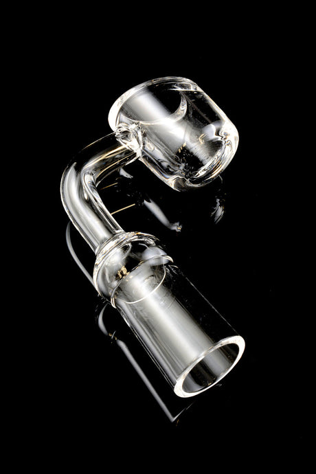 Side angle of clear 14.5 mm female quartz banger with curved neck, deep bucket and ground joint, 4 mm thickness, on black backdrop.