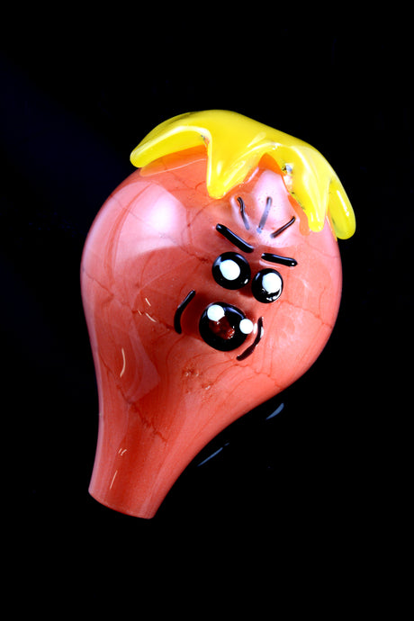 Red character bubble carb cap with yellow drip “hair” and animated face, clear glass tip for use on flat-top bangers.