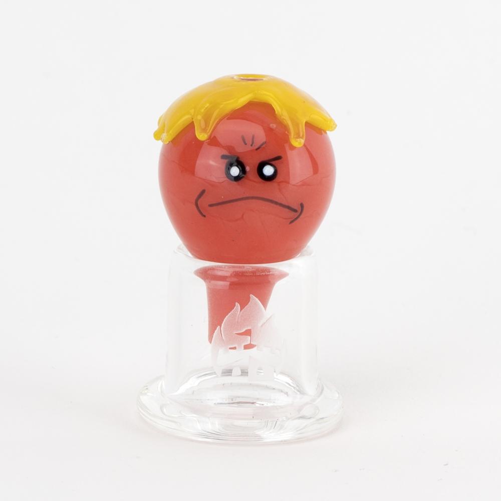 Straight-on image of red bubble cap on clear stand showing stern face and rounded shape for directional airflow.