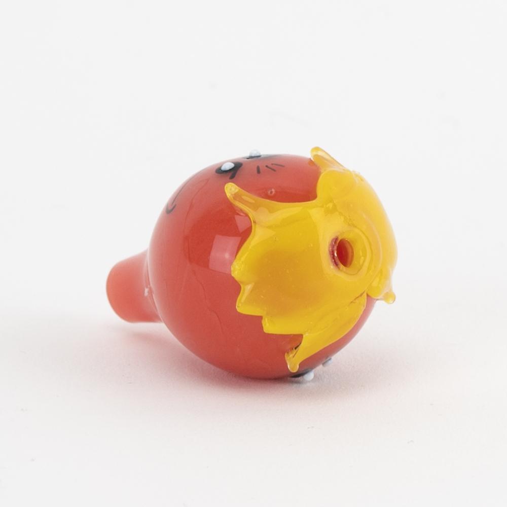 Top-down view highlighting yellow drip crown and center airflow hole on the red Empire Glassworks bubble cap.