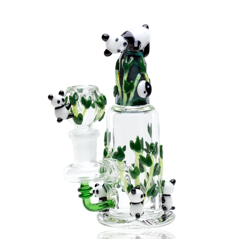 Side view of compact glass rig with clear beaker body, reinforced stemless arm, pandas, and bamboo art