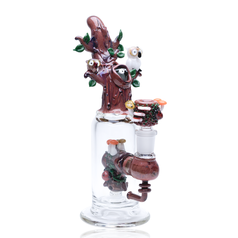 Front view of Hootie’s Tree mini rig showing mushroom-trimmed bowl, owl accents, and reinforced stemless joint on compact body.