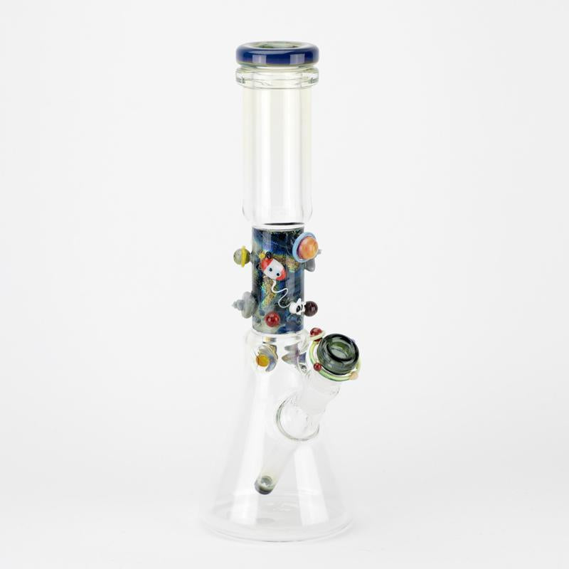 Full-body product image of handmade Galactic beaker glass bong on white backdrop, displaying ice pinch and sturdy flared base for stable tabletop use.