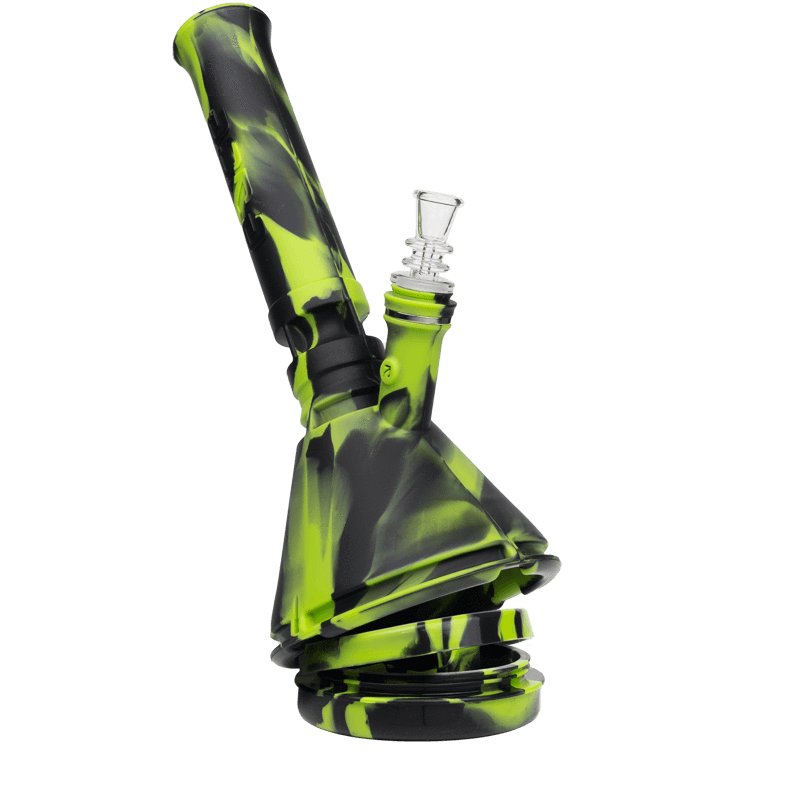 Green and black Eyce silicone beaker bong partially collapsed for travel, highlighting flexible silicone body and attached clear glass bowl.
