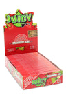 Juicy Jay’s Strawberry/Kiwi 1¼ flavored rolling papers display box, open with rows of red booklets ready for retail shelves.