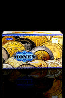 Box of Satya Nag Champa incense sticks with various incense labels visible.