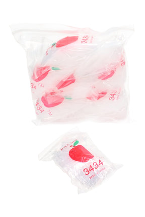 Close-up of numerous Apple Bags 34×34 mini baggies inside a large clear zip pouch, red apple graphics visible throughout