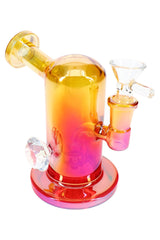 Yellow and red metallic glass mini bong with jewel grip, 14 mm joint, and round foot base, 5″ tall.