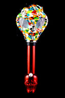 Red skull-base acrylic bong attached to white mask covered in colorful skull decals and eye ports.