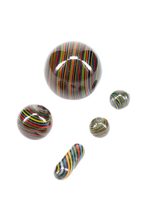 Dark multicolor striped quartz marble and terp pearl set, five pieces shown separately to highlight glossy finish and vivid banding on clear background.
