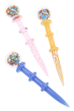 Three 5.5-inch crystal-ball glass dab tools with multicolor frit globes and pastel, gold, and blue spiral stems, displayed on white background.