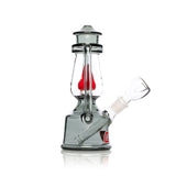 Side angle of 7″ Bowlman Lantern bong highlighting smoke-tinted base, upright lantern frame and forward-facing glass bowl joint.