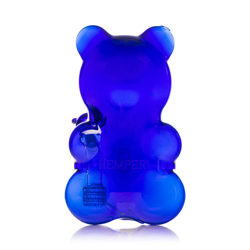 Rear view of Hemper Gummy Bear XL deep blue glass bong with smooth bear back, visible matrix perc in base and Hemper logo.