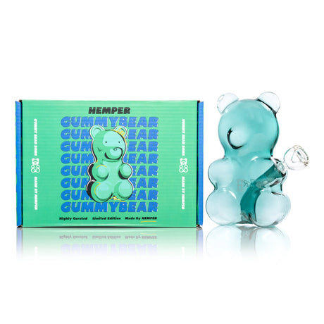 Hemper 6.5″ Gummy Bear glass bong posed beside branded packaging, showing cute candy bear body and recessed shoulder joint.
