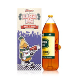 Side view of Hemper Forty Ounce XL amber bottle bong with green label and Rager Box, emphasizing tall party-ready water pipe.