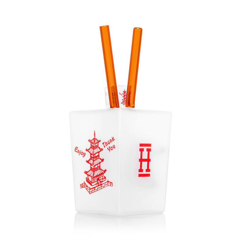 Rear three-quarter view of Hemper Chinese Takeout Box XL novelty glass bong highlighting frosted box body and upright amber chopsticks tubes.