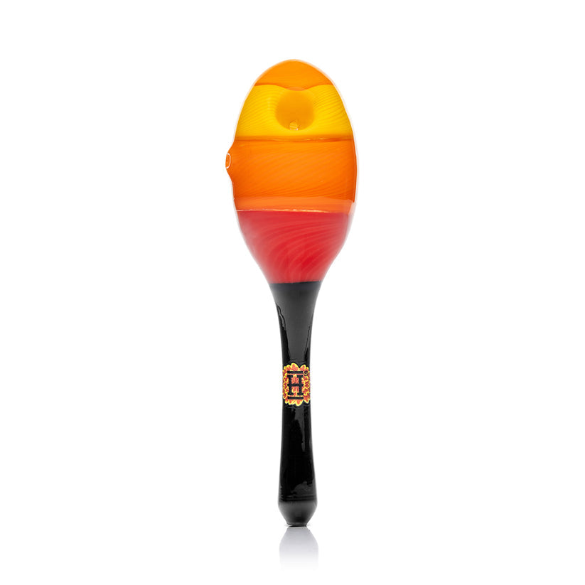 Straight-on view of Hemper Dia De Los Muertos maraca glass hand pipe highlighting 6″ length, fixed bowl and tri-color maraca design.