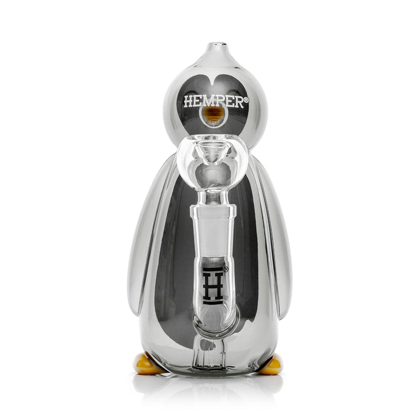 Rear view of 6.2″ Hemper Penguin glass bong showing attached clear 14.5 mm bowl, internal perc and smoke-tinted body resting on orange feet.