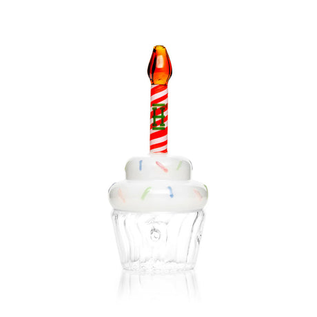 Cupcake-shaped glass hand pipe with white sprinkle top, clear base, and red swirl candle stem