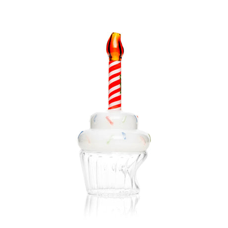 Side view of cupcake glass hand pipe with clear base, frosted top, and red-and-white candle stem
