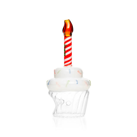 Side view of cupcake glass hand pipe with clear base, frosted top, and red-and-white candle stem