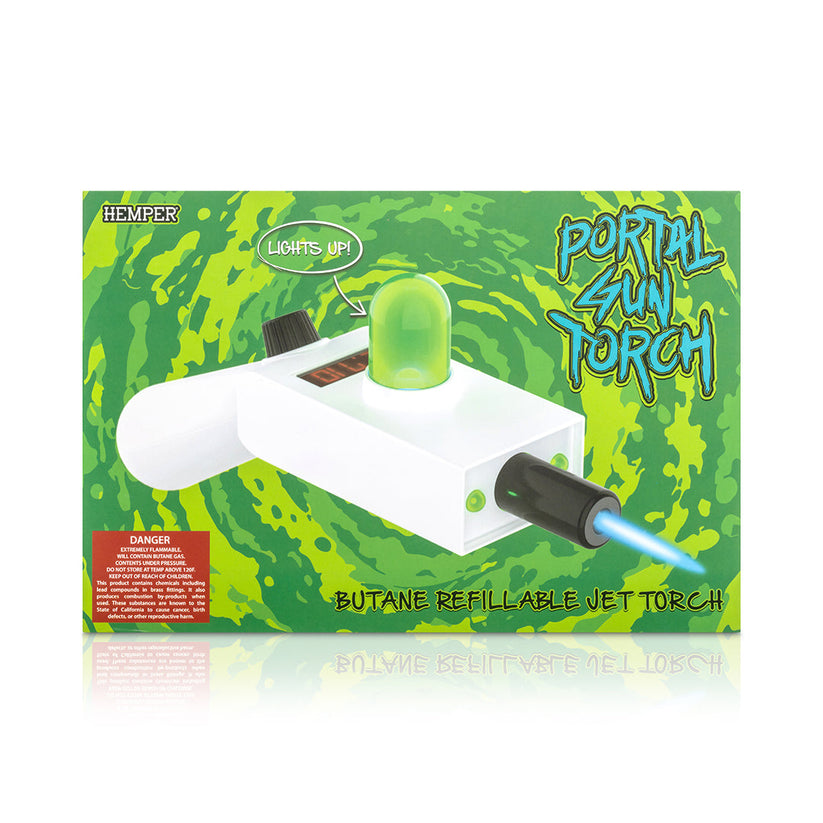 Hemper Portal Gun Torch retail packaging with swirling green portal design, lights-up callout and blue jet flame illustration across the front.