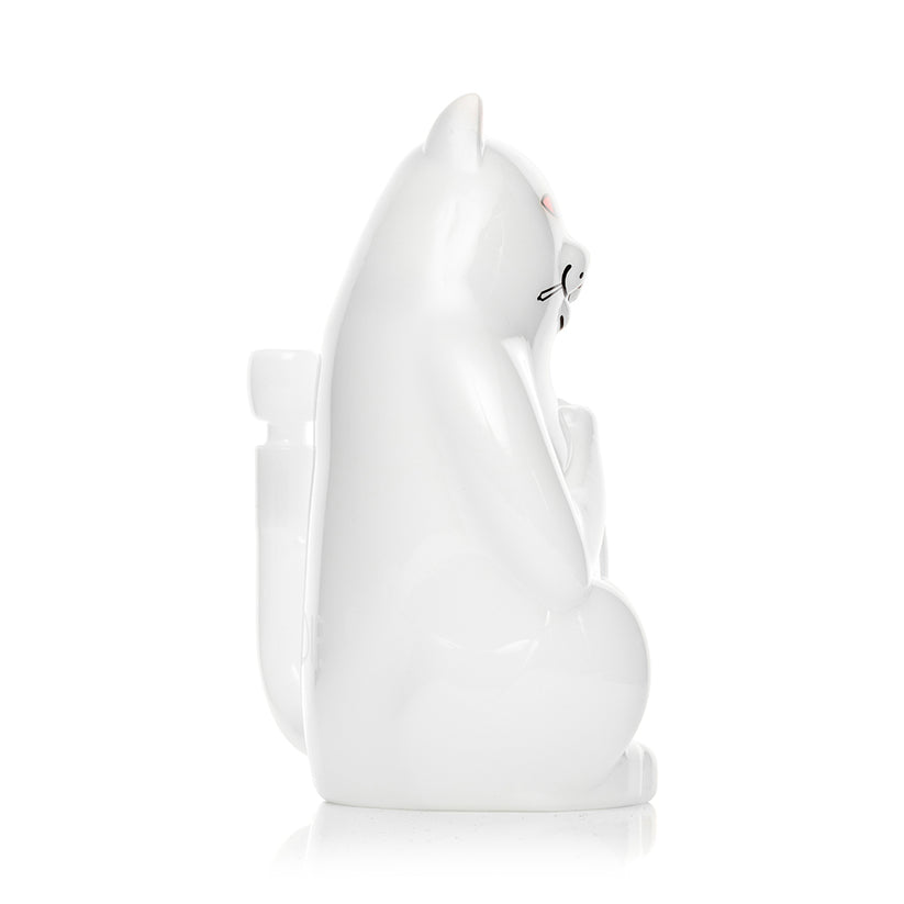Side profile of RIPNDIP x Hemper High Nermal white cat bong showing smooth glass body and rear tail bowl connection on white background.
