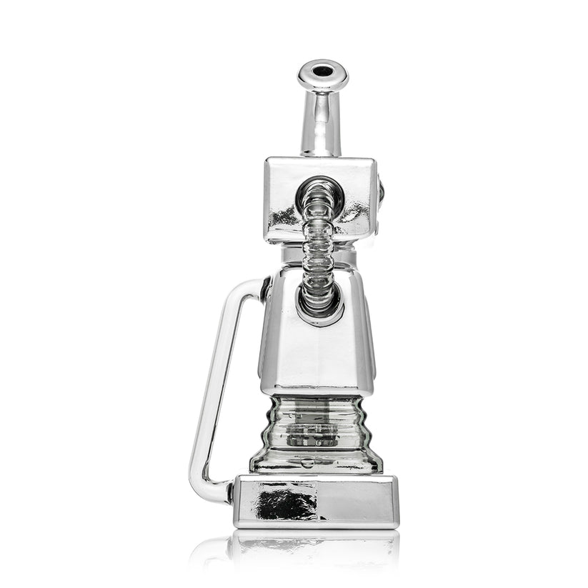 Side profile of chrome Hemper Hi-Robot XL recycler bong highlighting ribbed glass arm, angled neck mouthpiece, and stepped square base.