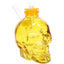 Yellow skull glass bong front view, funnel slide inserted, highlighting sculpted teeth and flat base