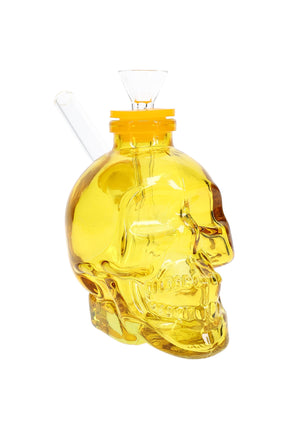 Yellow skull glass bong front view, funnel slide inserted, highlighting sculpted teeth and flat base