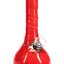Bright cherry-red ceramic bong decorated with subtle multicolor bursts and gold accent, photographed head-on.