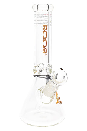 Clear ROOR 10-inch beaker bong with wood grain ROOR logo, ultra-thick 7 mm glass, glass-on-glass downstem and bowl, ice pinch.