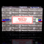 Box of Satya Nag Champa incense sticks with various incense labels visible.