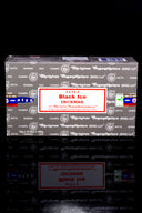 Box of Satya Nag Champa incense sticks with various incense labels visible.