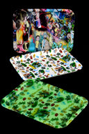 Small silicone rolling tray with pastel sugar-skull motif, 8″ × 6″, smooth nonstick surface and shallow rim; colors vary.