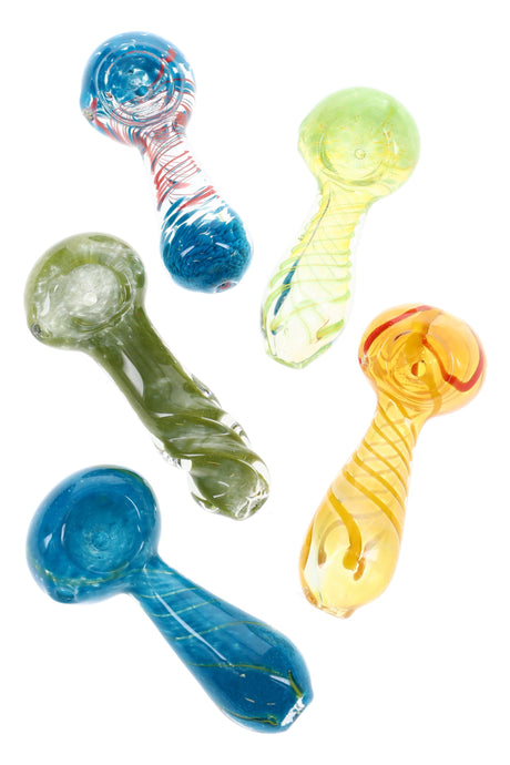 Group of five 3-inch spiral stripe glass spoon pipes in blue, green, yellow and mixed hues, displayed on white background