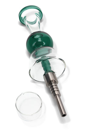 Dark green bubble-center dab straw close-up featuring the glass shield and metal tip next to a quartz dish.