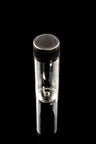 Tall 10 mL clear glass vial with secure black twist cap standing straight on glossy black background, showing full height