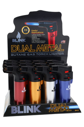 Display of 12 Blink Dual Metal butane torch lighters in red, gold, silver and blue with locks and adjustable flame.