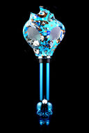 Blue skull-base acrylic bong attached to light-blue tattoo-style decal gas mask with eye openings.