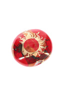 2-inch round ceramic smoke stone hand pipe in cherry red with gold sun design and glossy glaze.